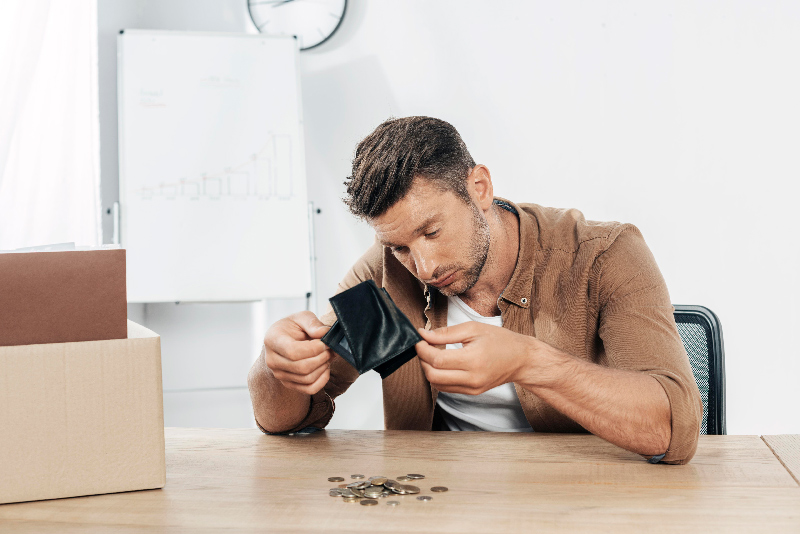 medium shot man checking wallet